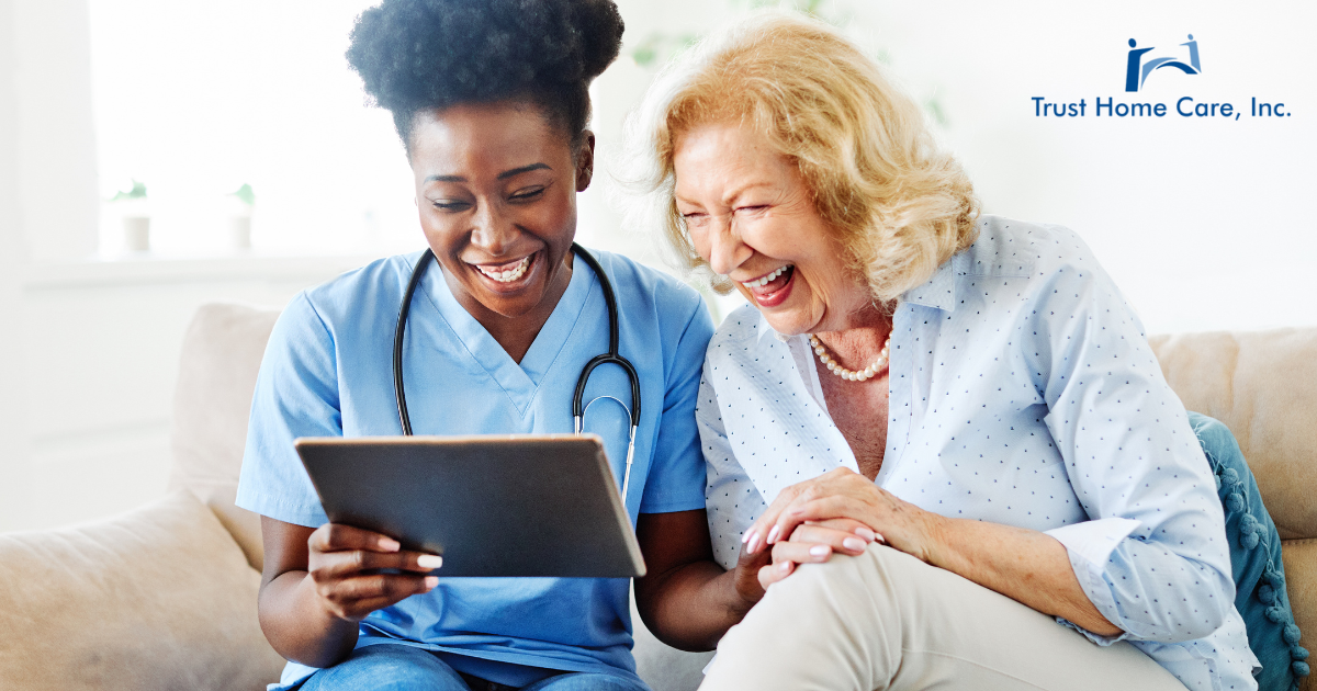Home health care careers can be enjoyable as demonstrated by this nurse who is laughing and enjoying her time with her senior patient.