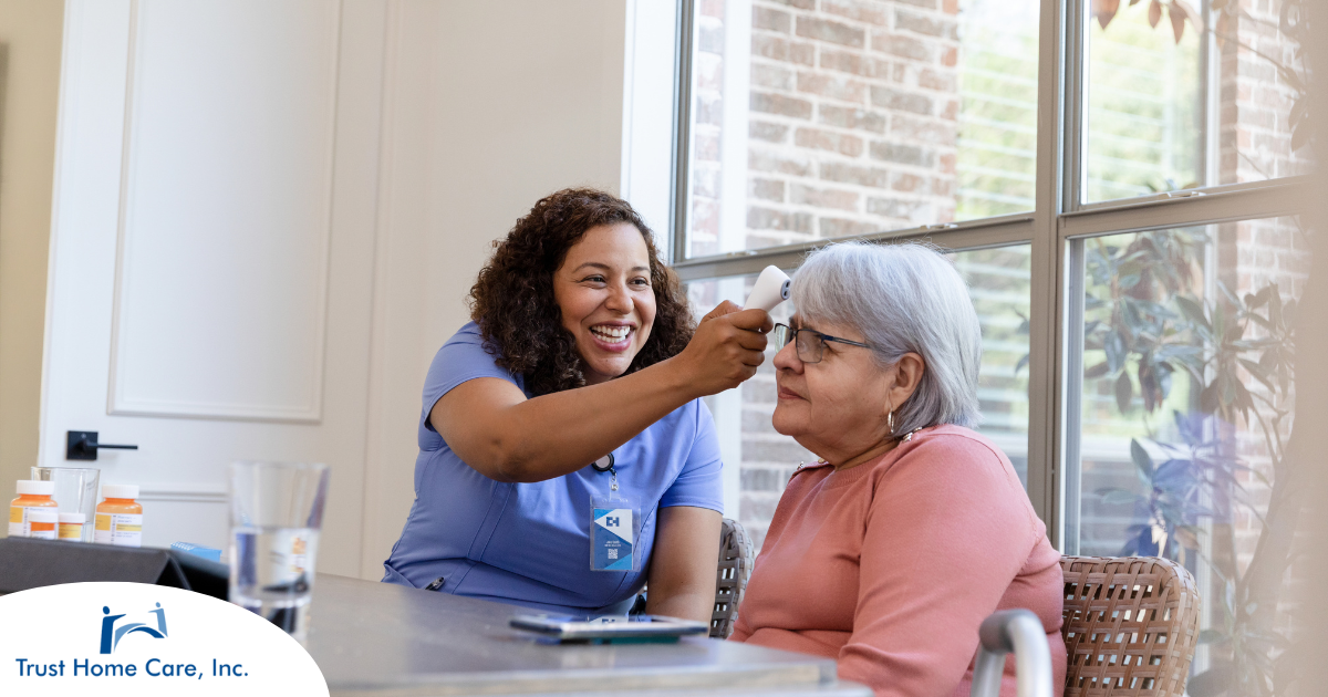 A woman working in home health care gladly takes vitals for a senior patient.