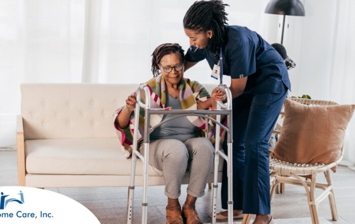 A care professional helps an older woman get up with the use of a walker, representing how occupational therapy can help with recovery.
