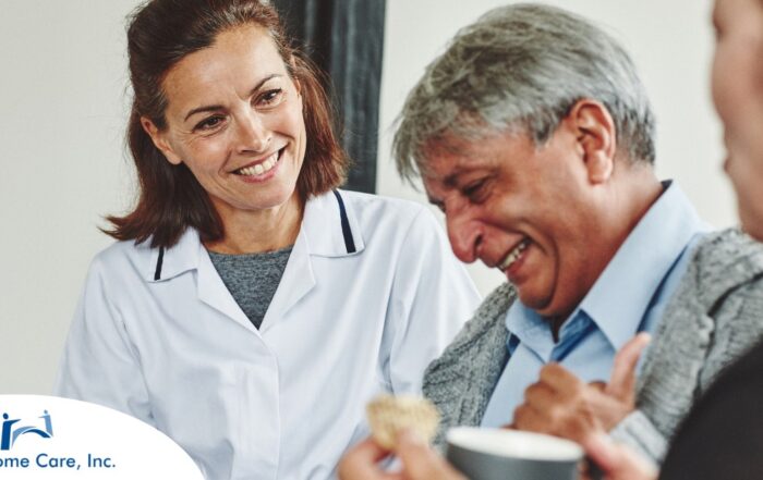 A woman smiles while with clients showing how you can enjoy senior caregiver jobs.