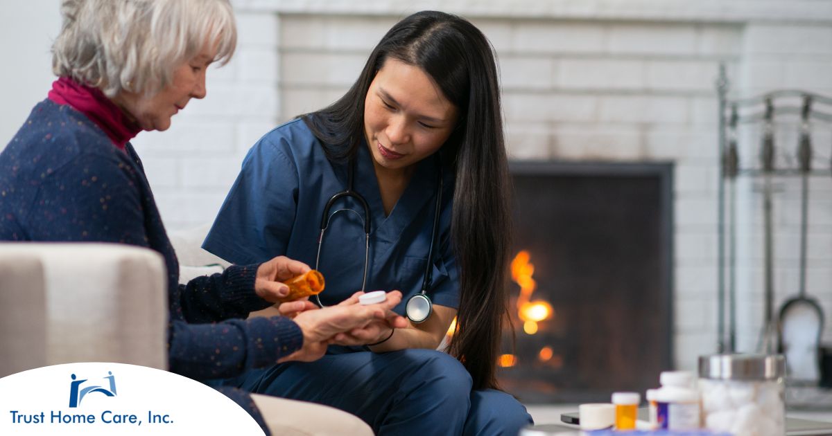 A nurse helps a patient at home with her medications, representing how home health nurses can help with disease management.